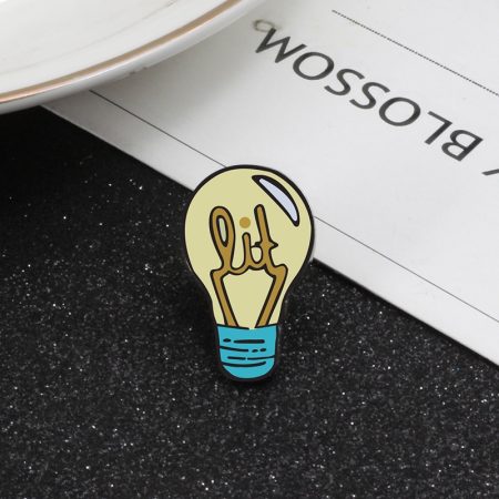 Light bulb enamel pin