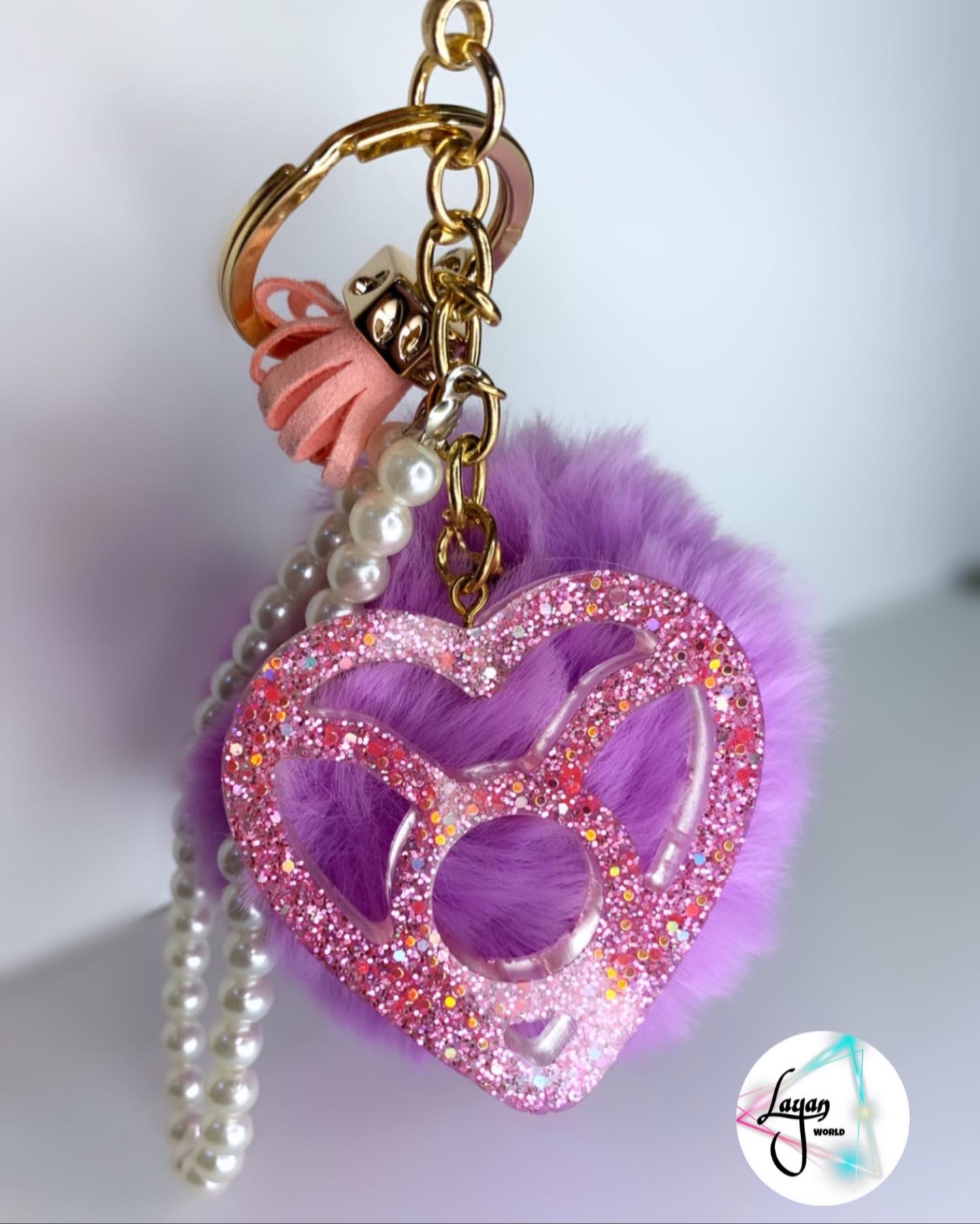 pink glitter keychain with pompom