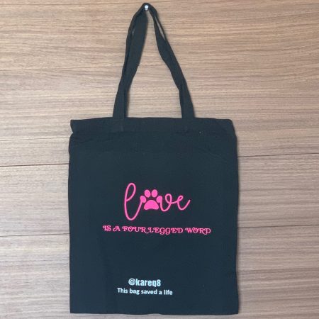 Love is a four-legged word tote bag